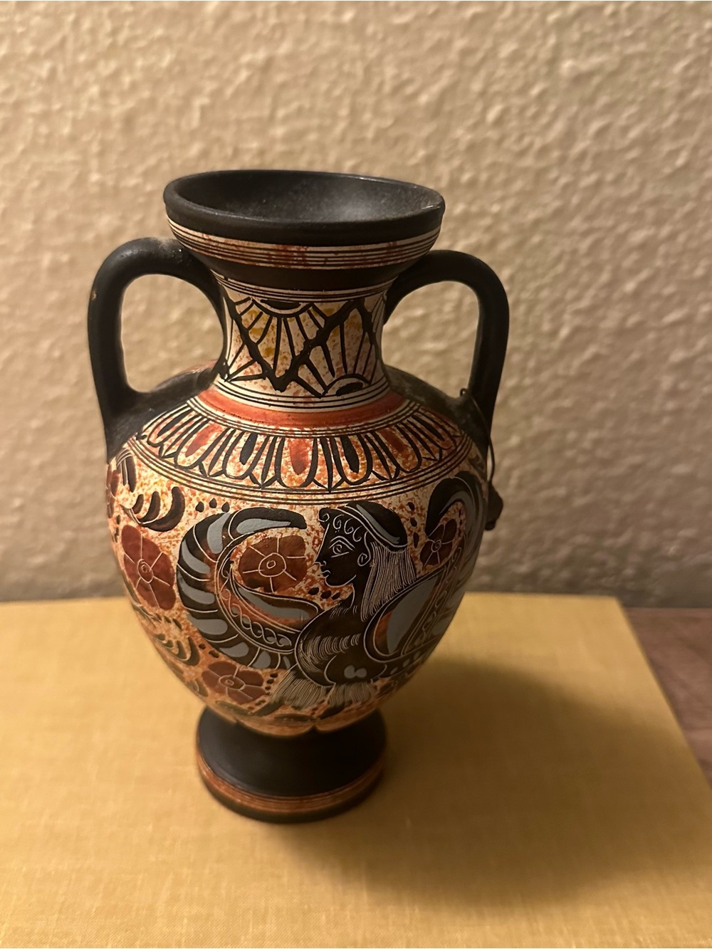 This is a replica of a Corinthian amphora which was produced circa 650 BC 6” H